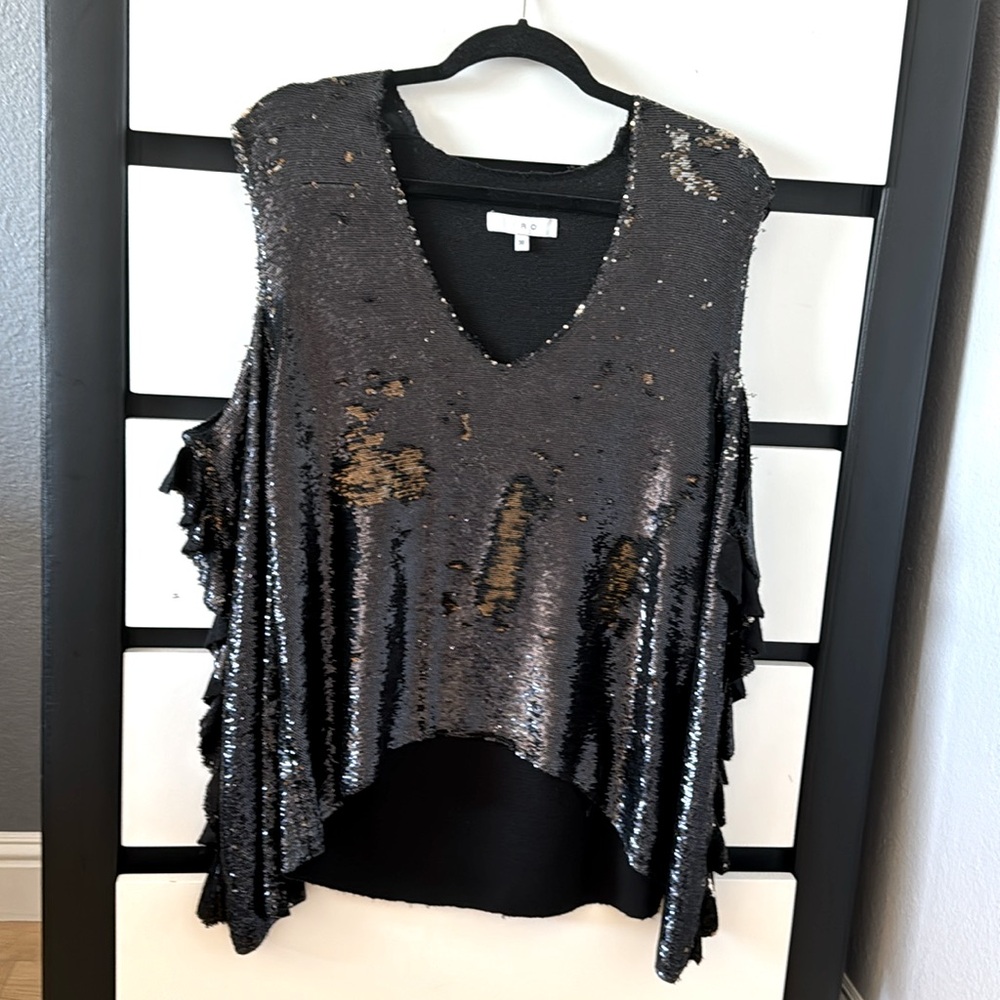 Gorgeous sequence IRO long sleeve v neck top. Size 36 (4-6) black sequence.